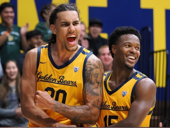 Jaylon Tyson, left, celebrates with teammate Jalen Cone